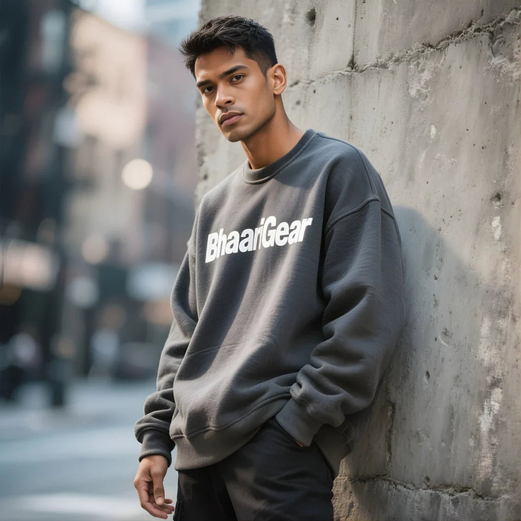 Indian man in a BhaariGear oversized sweatshirt styled in premium urban streetwear.