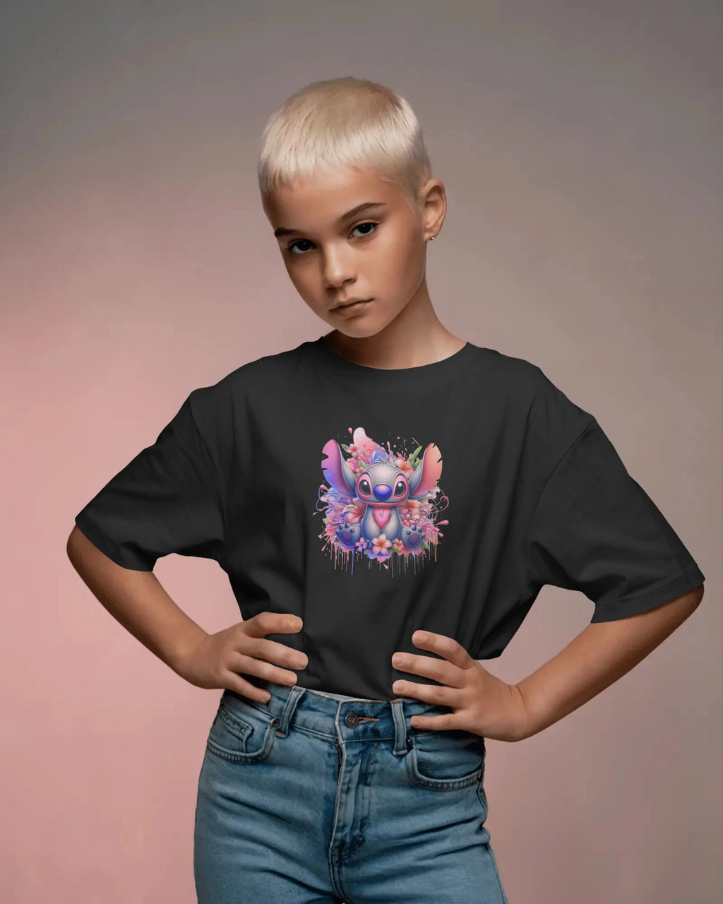 Child wearing a black t-shirt with a colorful character design on a gradient background