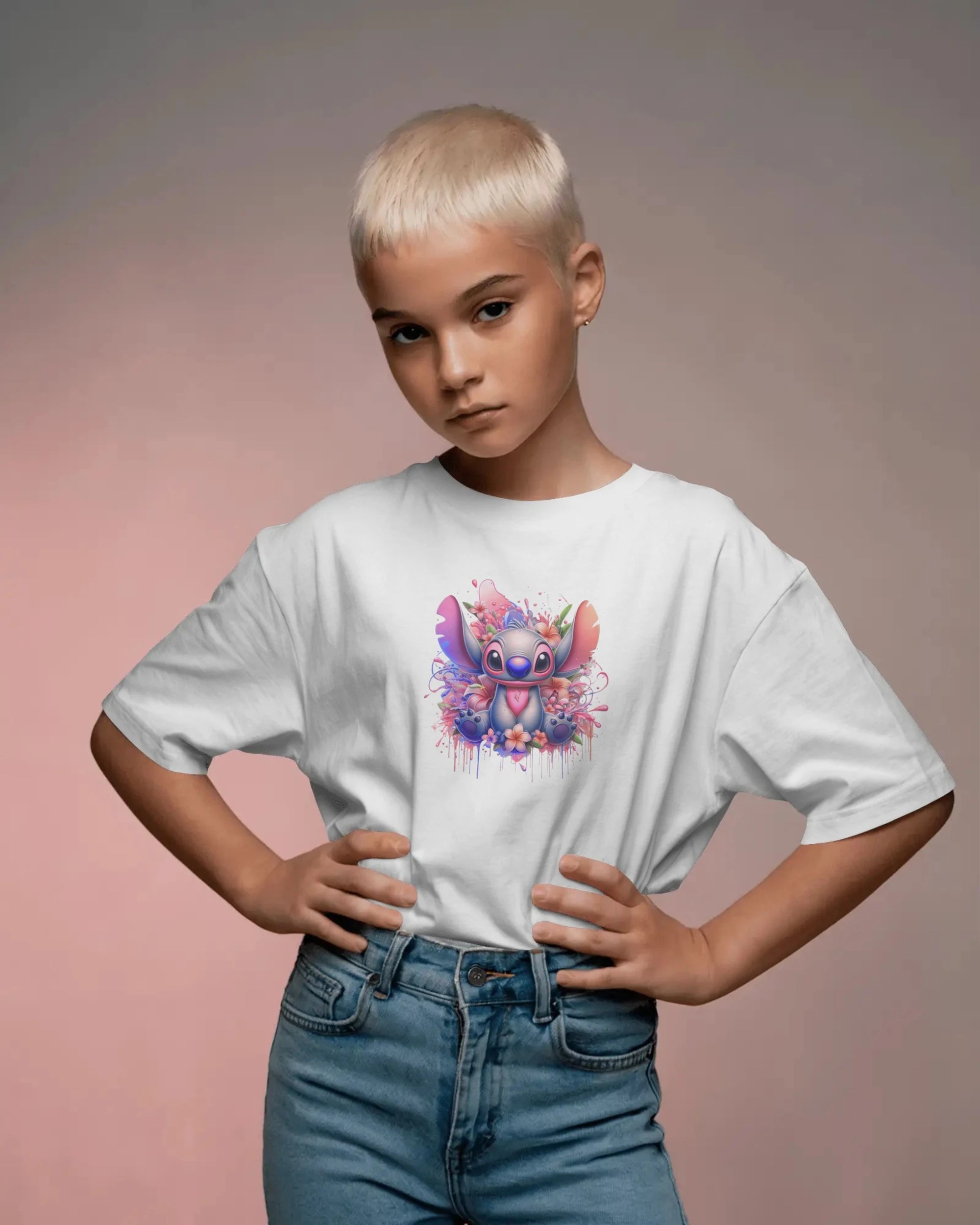 Person wearing a white t-shirt with a colorful graphic design on a gradient background