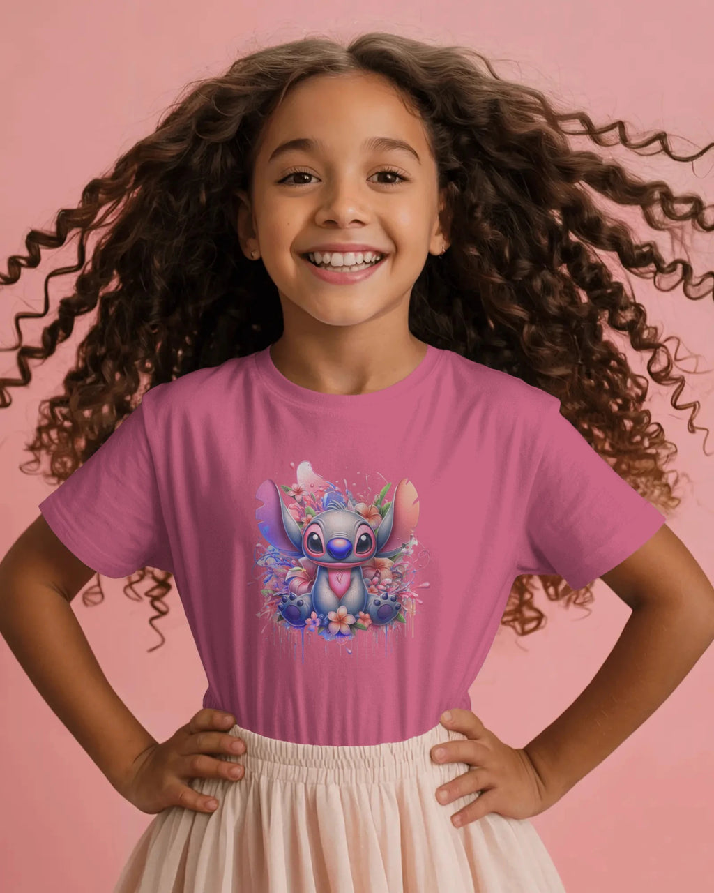 Young girl wearing a pink t-shirt with a cartoon character on a pink background