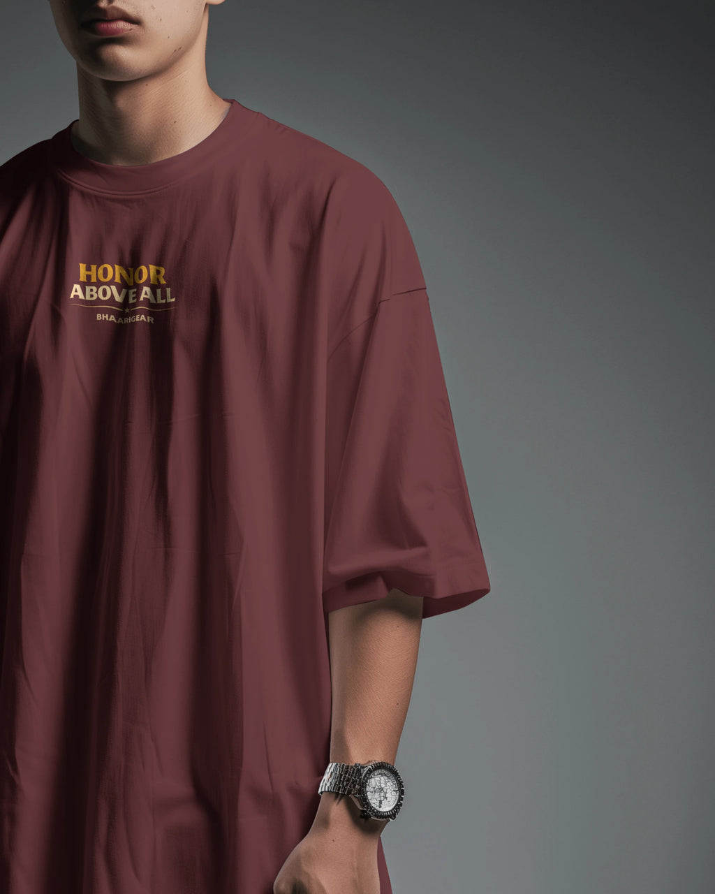 Maroon oversized T-shirt by BhaariGear featuring Honor Above All Warrior Legacy graphic on front, side view.