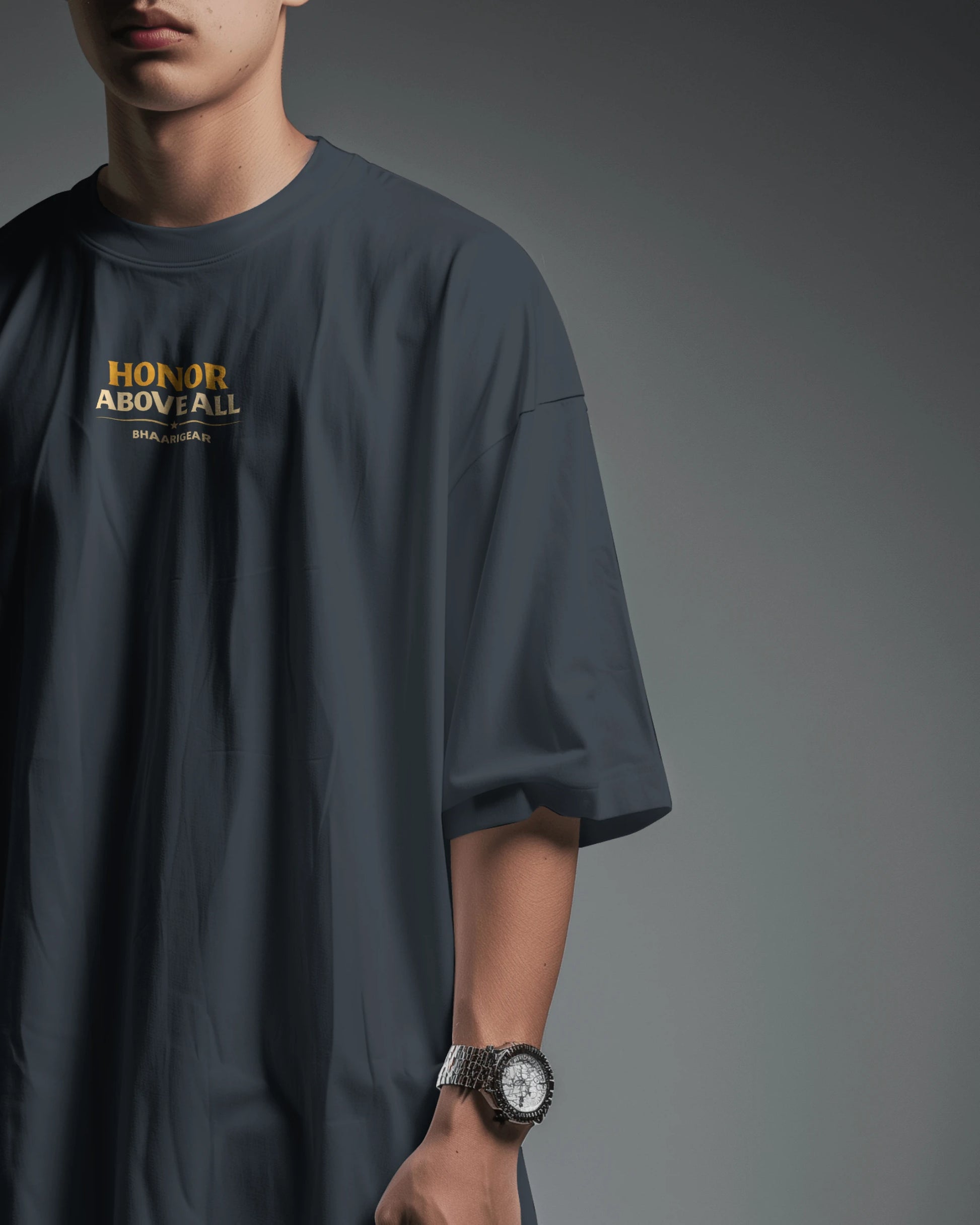 Navy blue oversized T-shirt by BhaariGear featuring Honor Above All Warrior Legacy graphic on the front, side view.