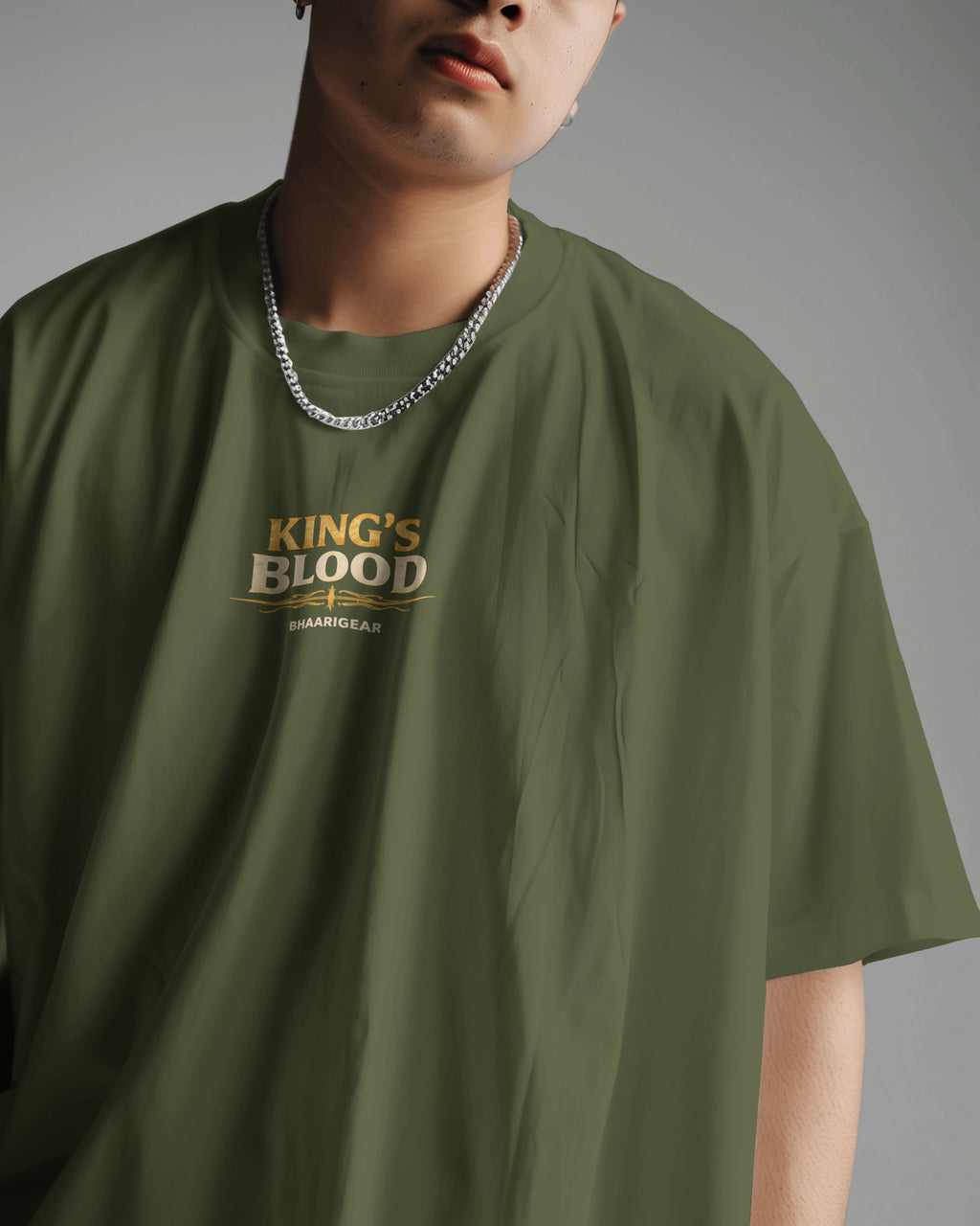 Olive green Kings Blood Legacy graphic oversized T-shirt by BhaariGear, front view showing bold design and relaxed fit.