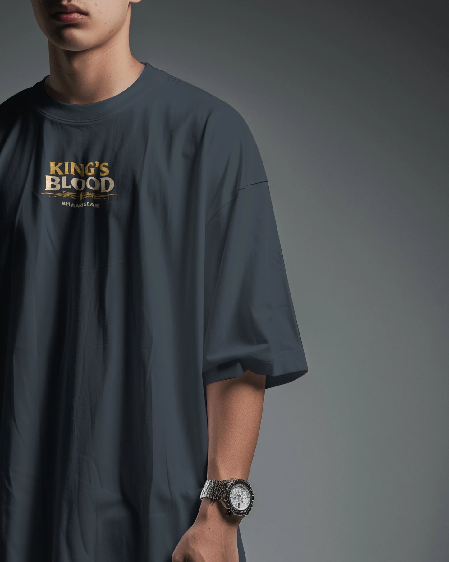 Navy blue Kings Blood Legacy graphic oversized T-shirt by BhaariGear, front and side view showing bold design and comfortable fit.