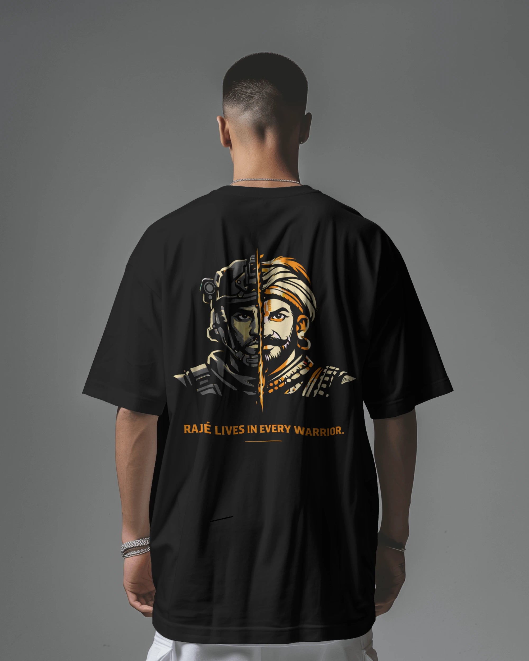 Back view of black BhaariGear Raje Lives Warrior oversized graphic T-shirt with bold front design and comfortable fit.