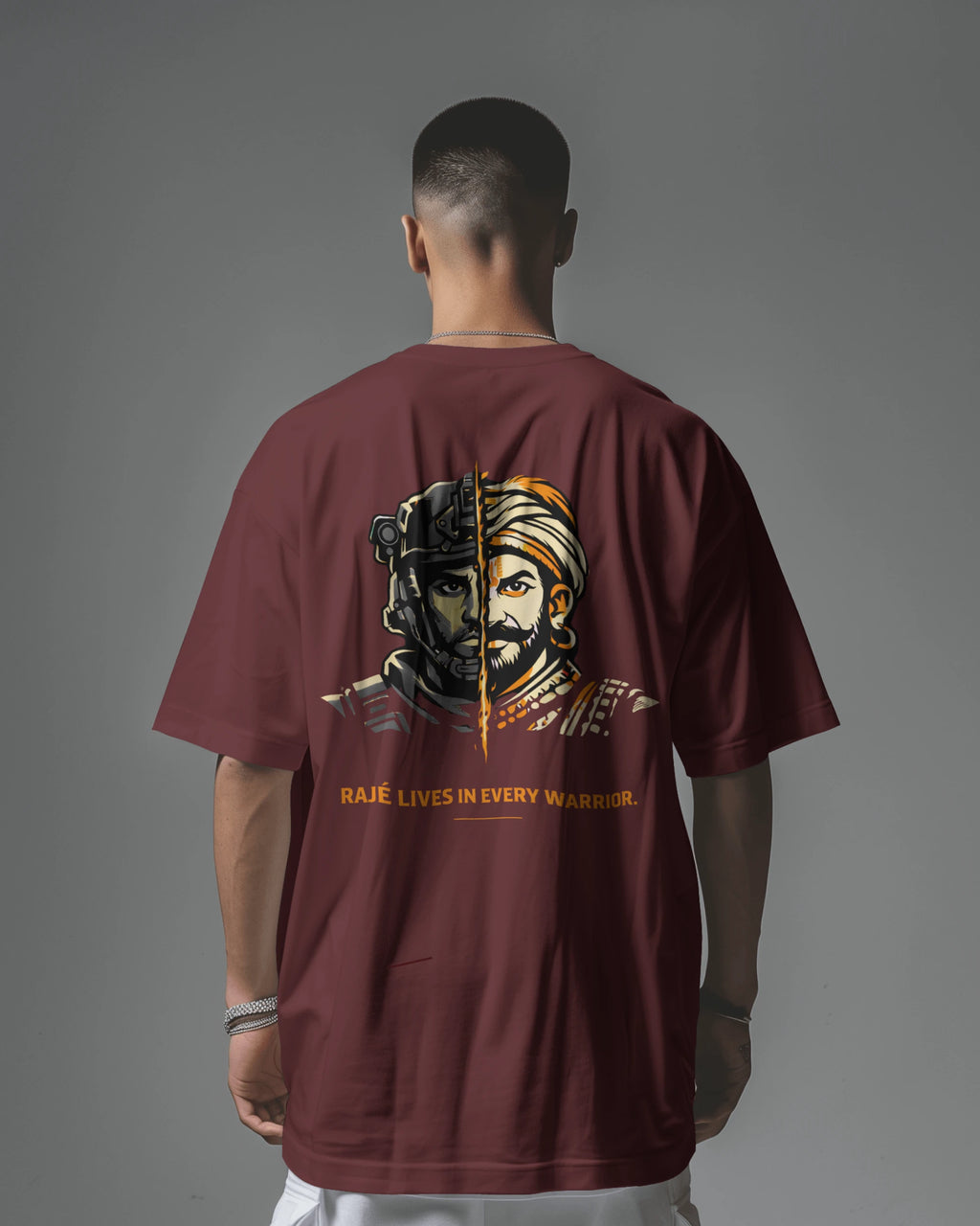 Maroon Raje Lives Warrior oversized graphic T-shirt by BhaariGear shown from the back with bold printed design.