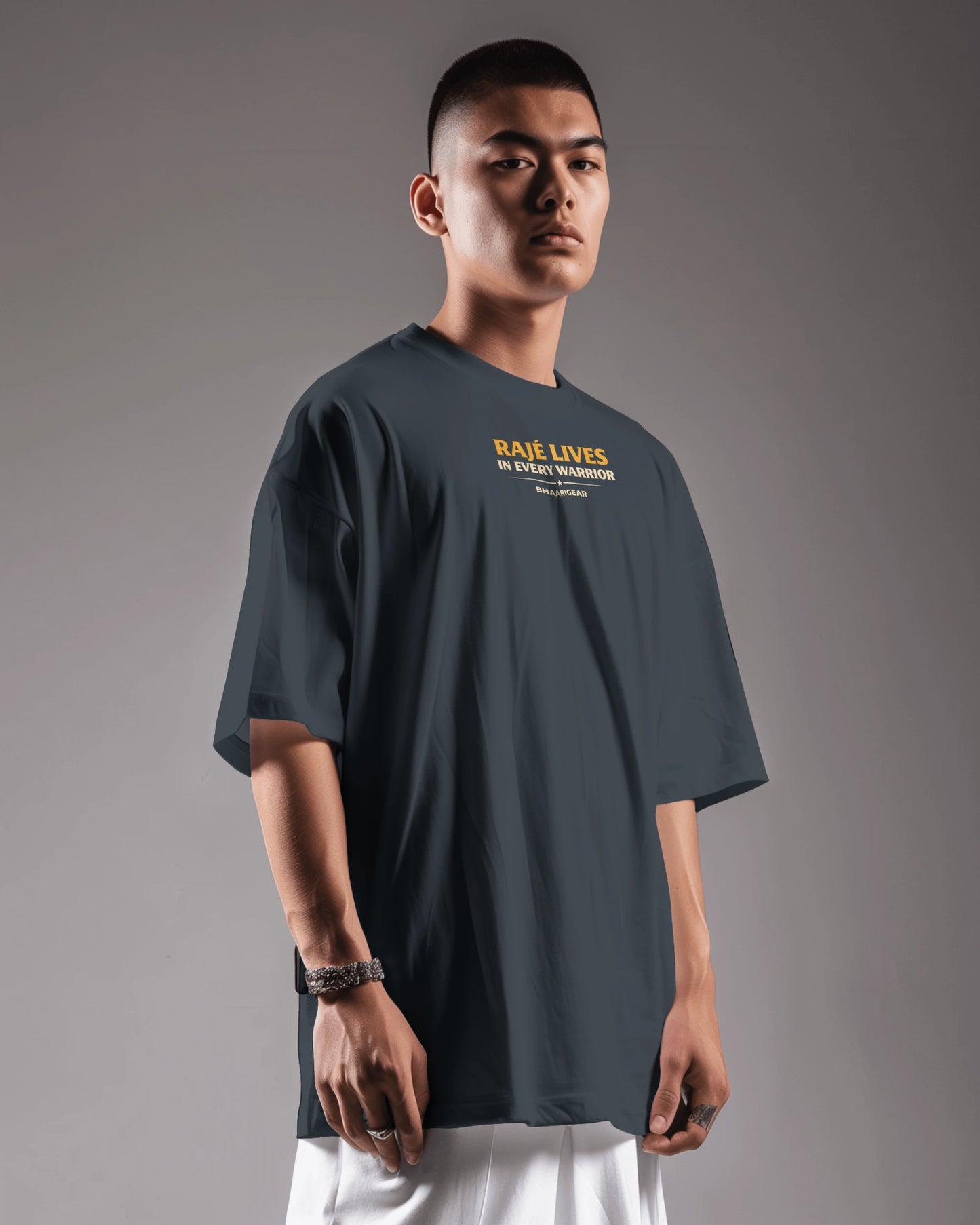 Front view of BhaariGear Raje Lives Warrior oversized graphic T-shirt in blue navy, featuring bold warrior design on the front.