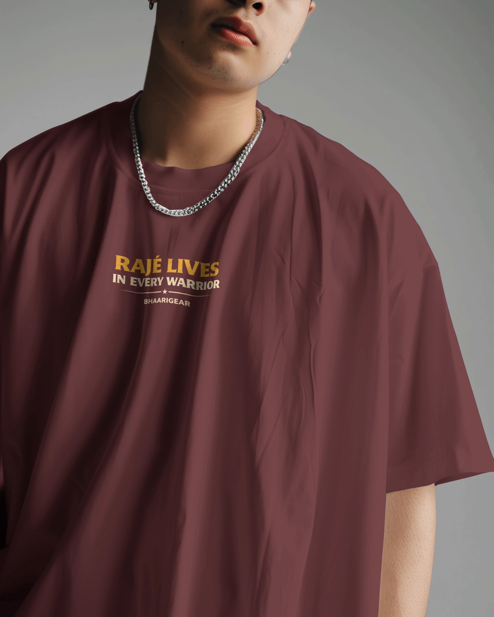 Maroon oversized graphic T-shirt by BhaariGear featuring Raje Lives Warrior design on the front.