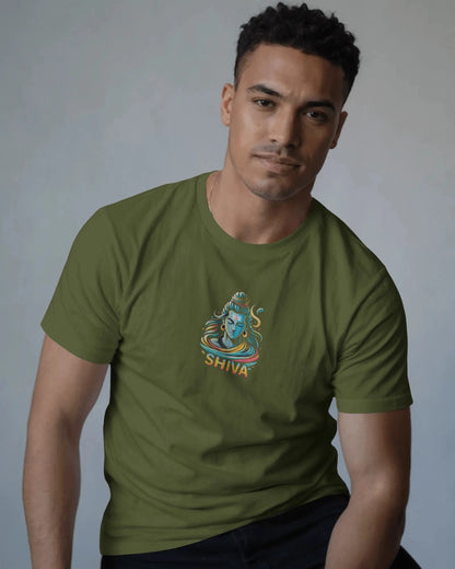 Man wearing a green t-shirt with a Shiva graphic design on a gray background