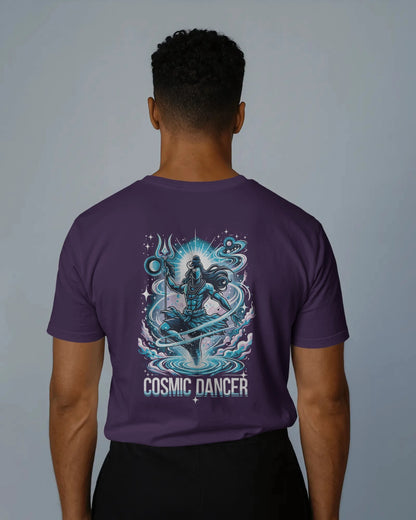 Person wearing a purple t-shirt with 'Cosmic Dancer' design on the back against a gray background