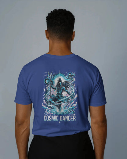 Person wearing a royal blue t-shirt with 'Cosmic Dancer' design on the back against a gray background