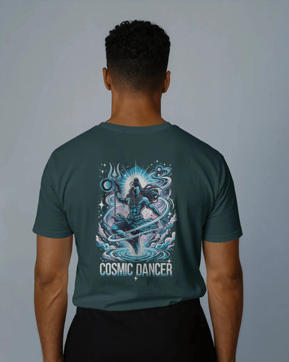 Person wearing a t-shirt with 'Cosmic Dancer' design on the back against a gray background