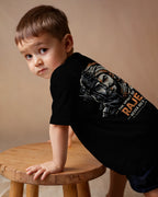 Black Spirit of Raje Kids T-shirt by BhaariGear featuring a warrior legacy design, shown from the back.