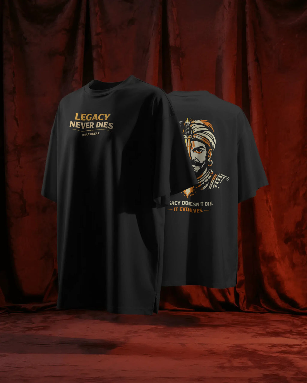 Black t-shirt with graphic design and text on a red curtain background