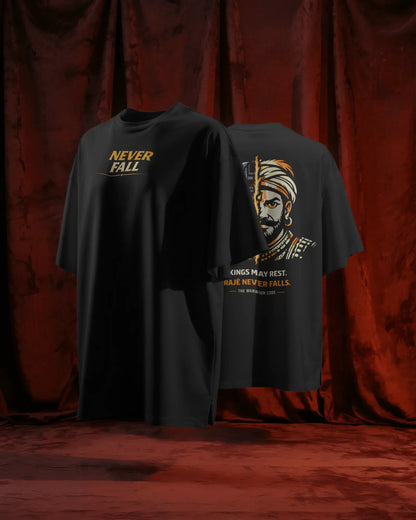 BhaariGear Never Fall Warrior Legacy oversized T-shirt displayed front and back on a stand against rich red curtains.
