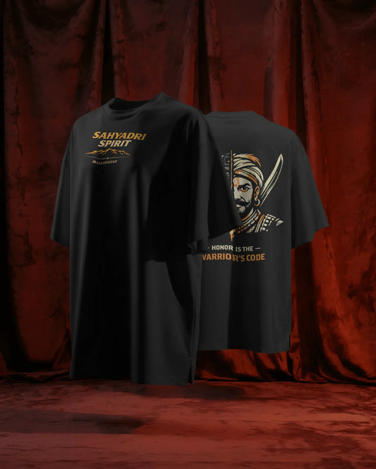 BhaariGear Sahyadri Spirit Warrior oversized T-shirt shown front and back on a floating stand against red curtains.