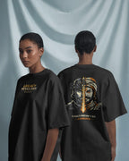 Female model wearing BhaariGear Warrior Legacy oversized T-shirt, front and back views against soft draped fabric background.