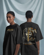 Two women wearing black t-shirts with a graphic design and text on a light gray background