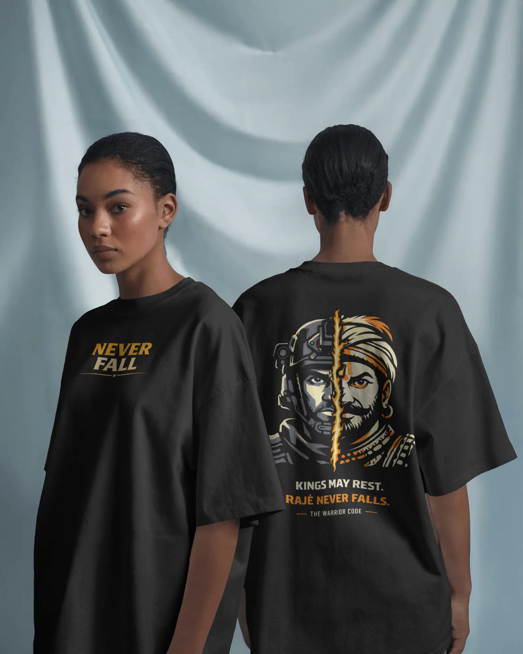 Female model wearing BhaariGear Never Fall Warrior Legacy oversized T-shirt, front and back views on soft fabric background.
