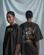 Front and back view of a female model wearing the Honor Above All Warrior oversized T-shirt by BhaariGear against soft fabric background.