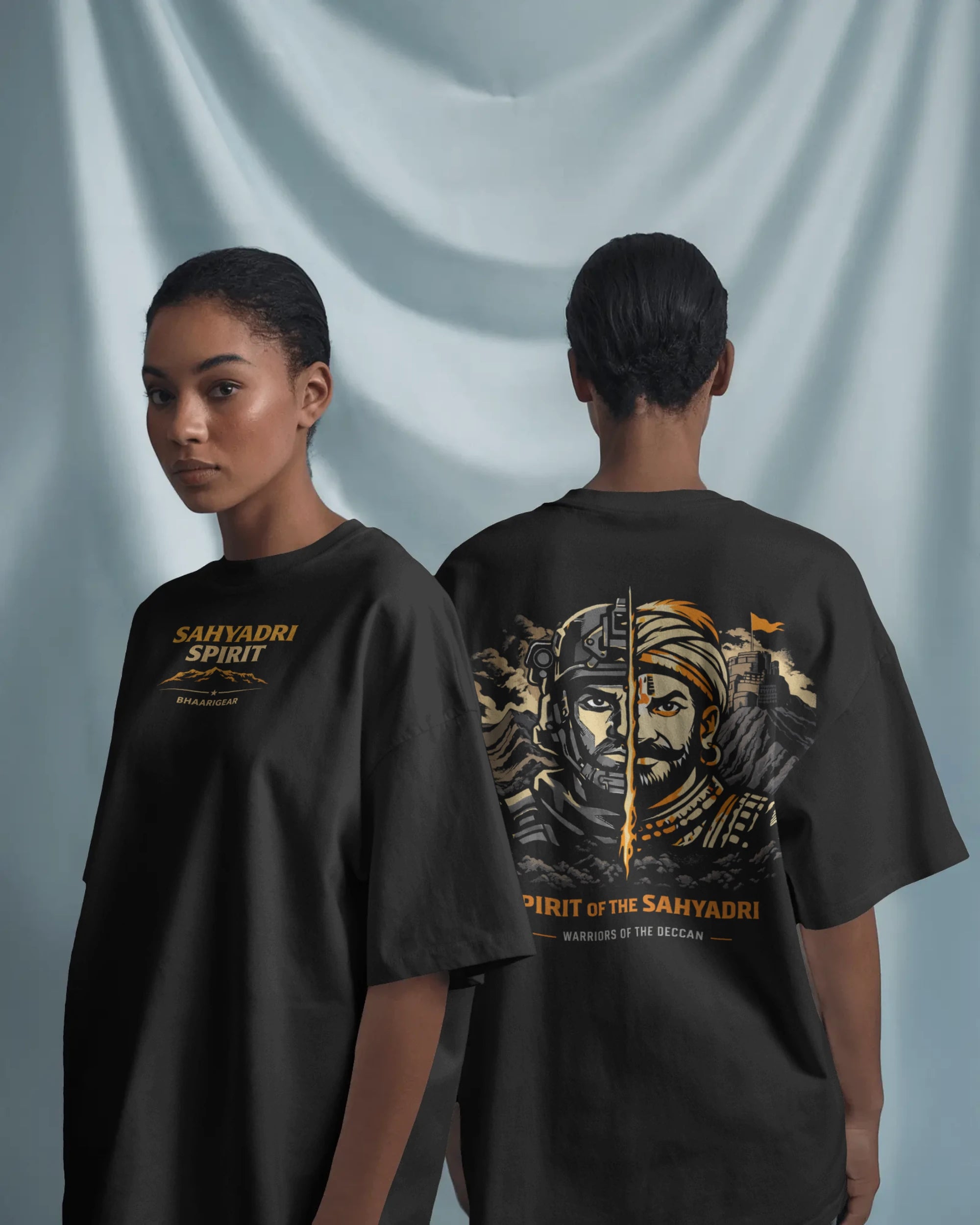 BhaariGear Sahyadri Spirit Warrior oversized T-shirt worn by female model, front and back views against soft fabric background.