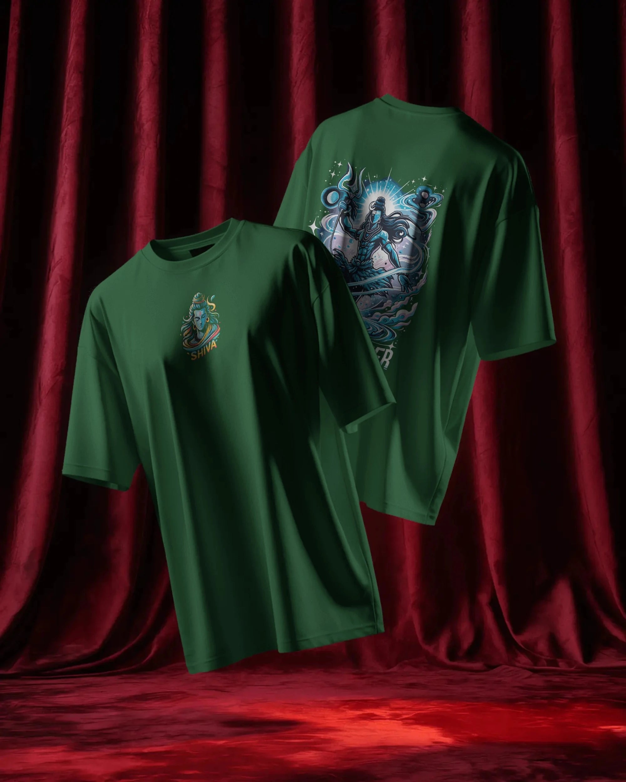 Two bottle green t-shirts with graphic designs on a red curtain background