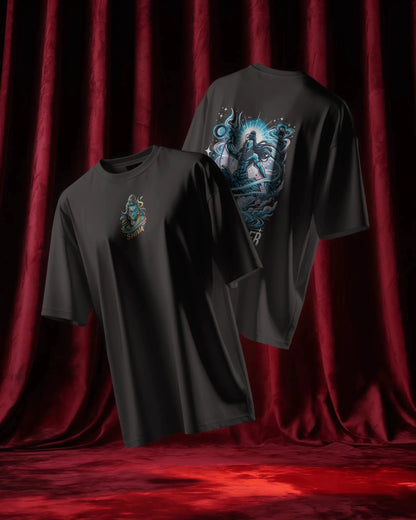 Two black t-shirts with graphic designs on a red curtain background