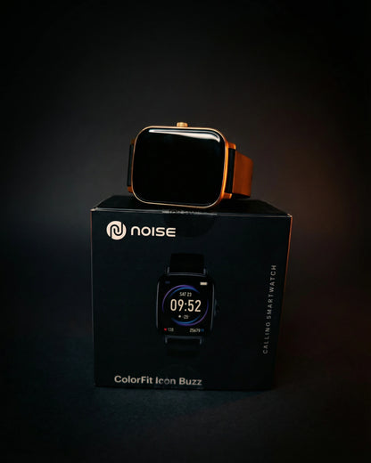 Black and gold Noise ColorFit Icon Buzz smartwatch by BhaariGear, showing its sleek design and digital display.