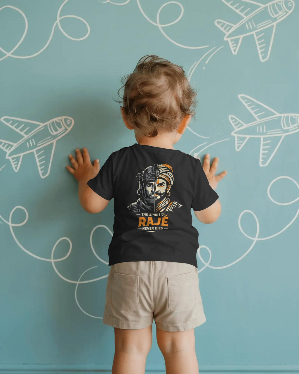 Black girls' T-shirt from BhaariGear featuring a warrior legacy design on the back, part of the Spirit of Raje collection.