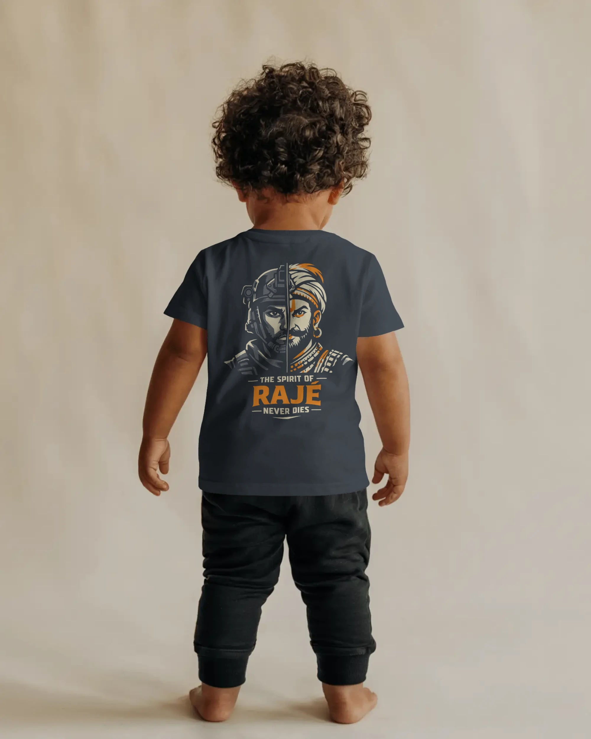 Back view of navy blue Spirit of Raje Girls T-shirt by BhaariGear featuring warrior legacy design for kids.