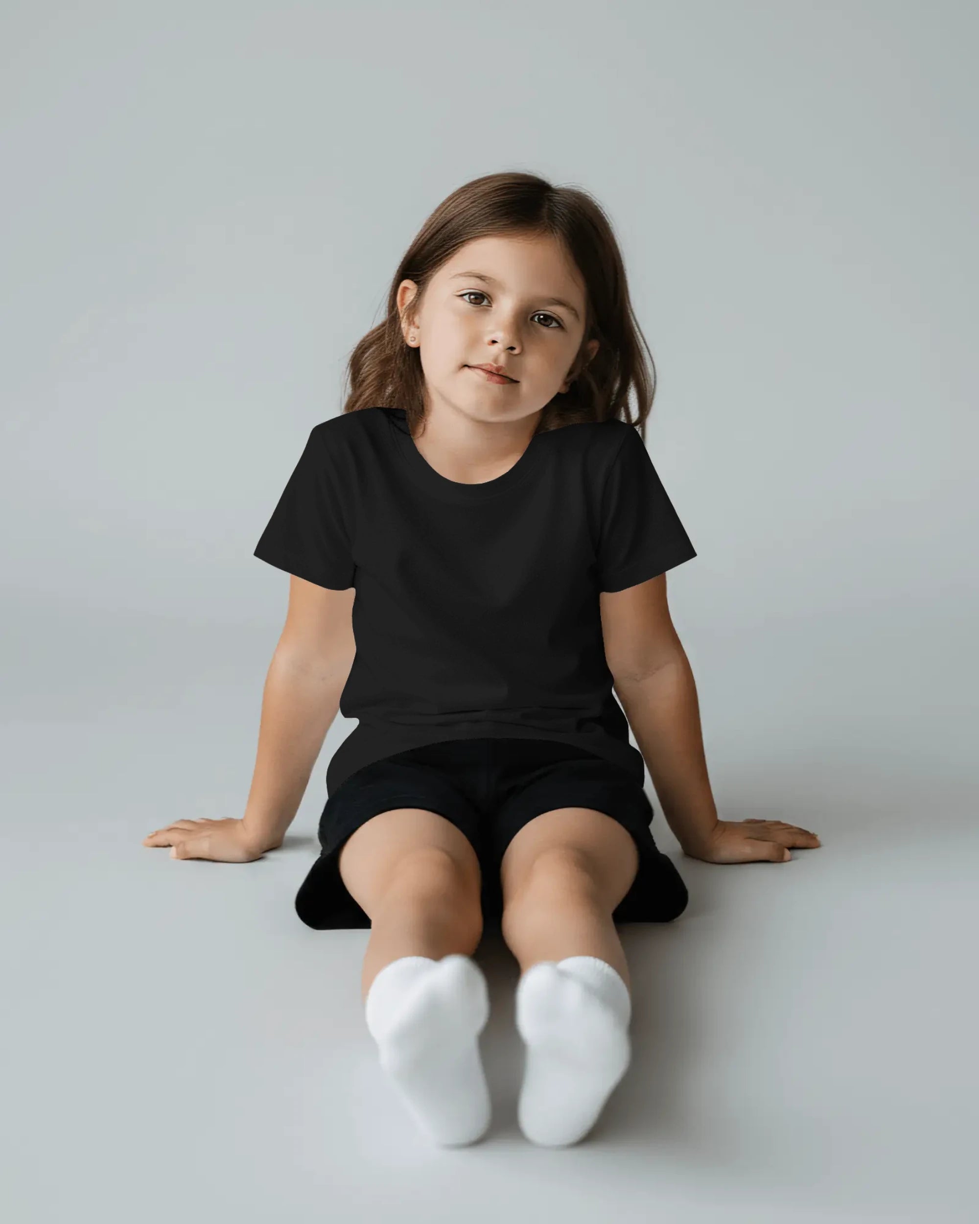 Black Spirit of Raje Girls T-shirt by BhaariGear featuring a warrior legacy design on the front, for kids' casual wear.